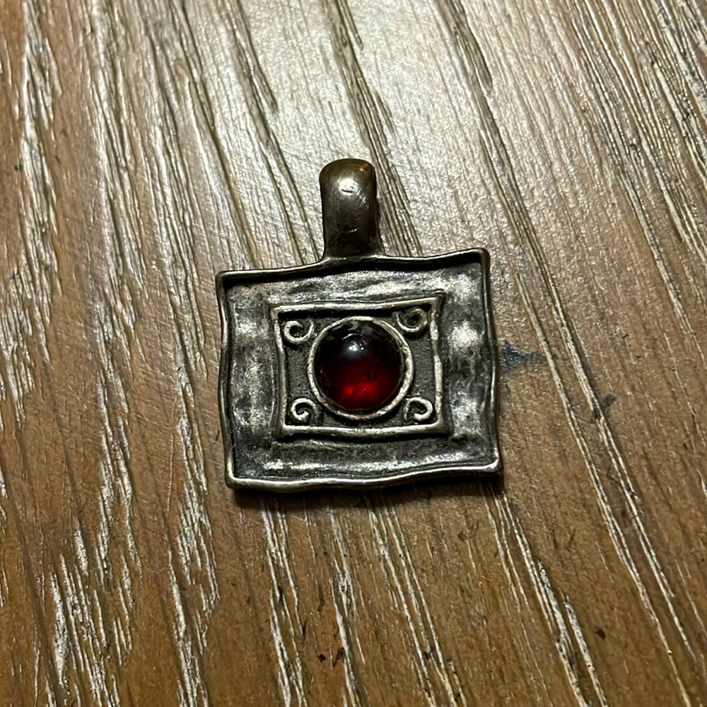 Lia Sophia, slide, bronze and color with red stone
